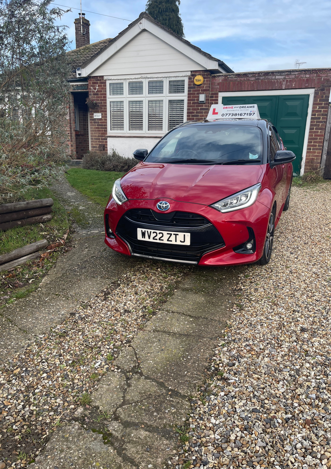 Joan with her driving instruction car